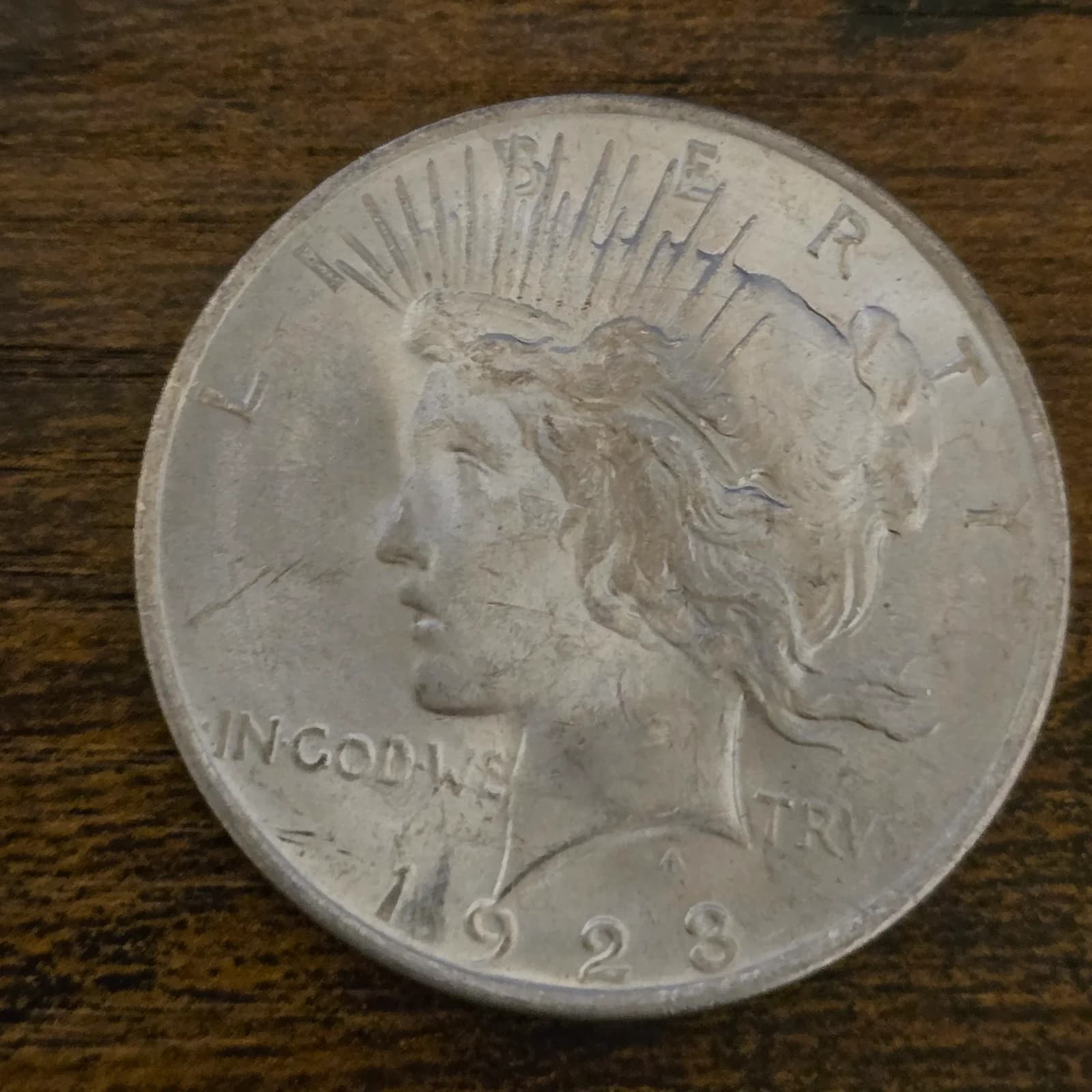 1923 Peace Silver Dollar raw coin, exact item photo