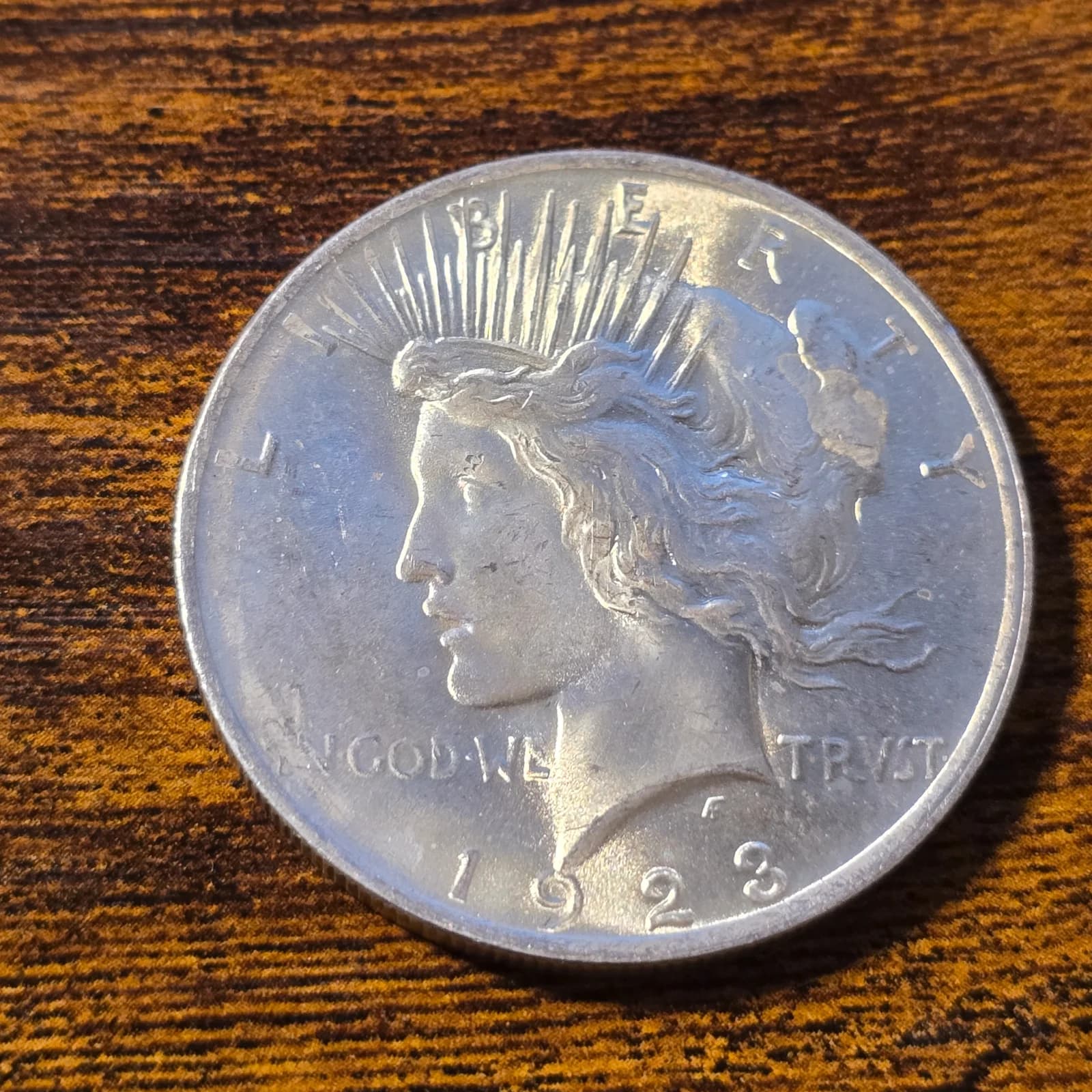 1923 Peace Silver Dollar raw coin, exact item photo