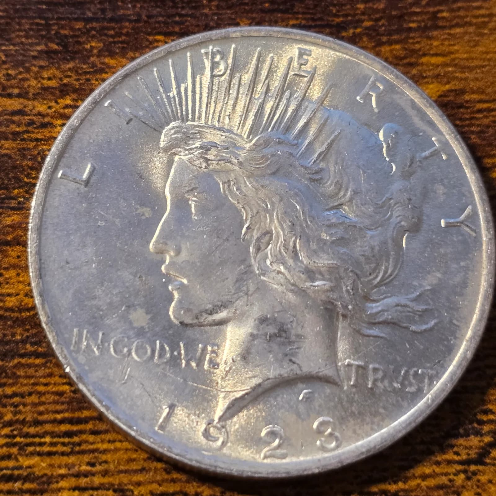 1923 Peace Silver Dollar raw coin, exact item photo