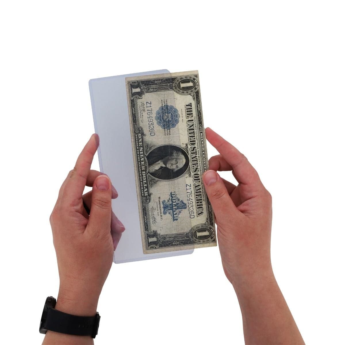 Hands inserting an oversized one-dollar bill into a clear BCW currency sleeve for secure protection and display.