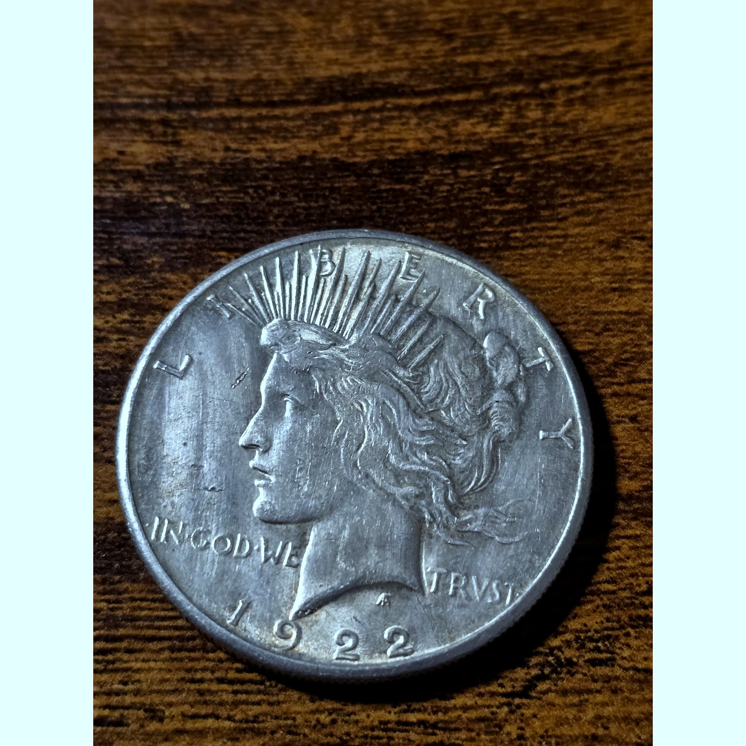 1922 Peace Silver Dollar raw coin, exact item photo