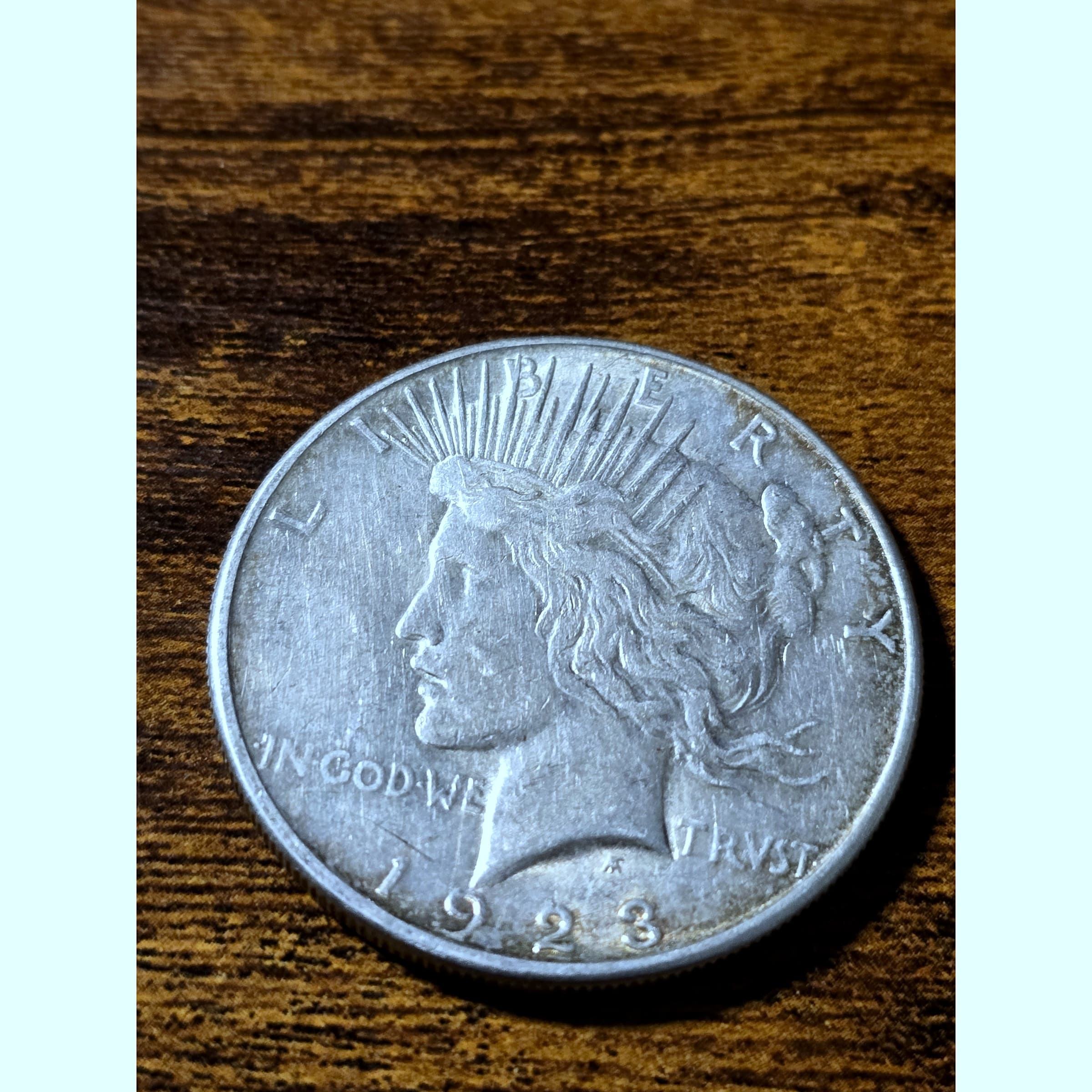 1923 Peace Silver Dollar raw coin, exact item photo