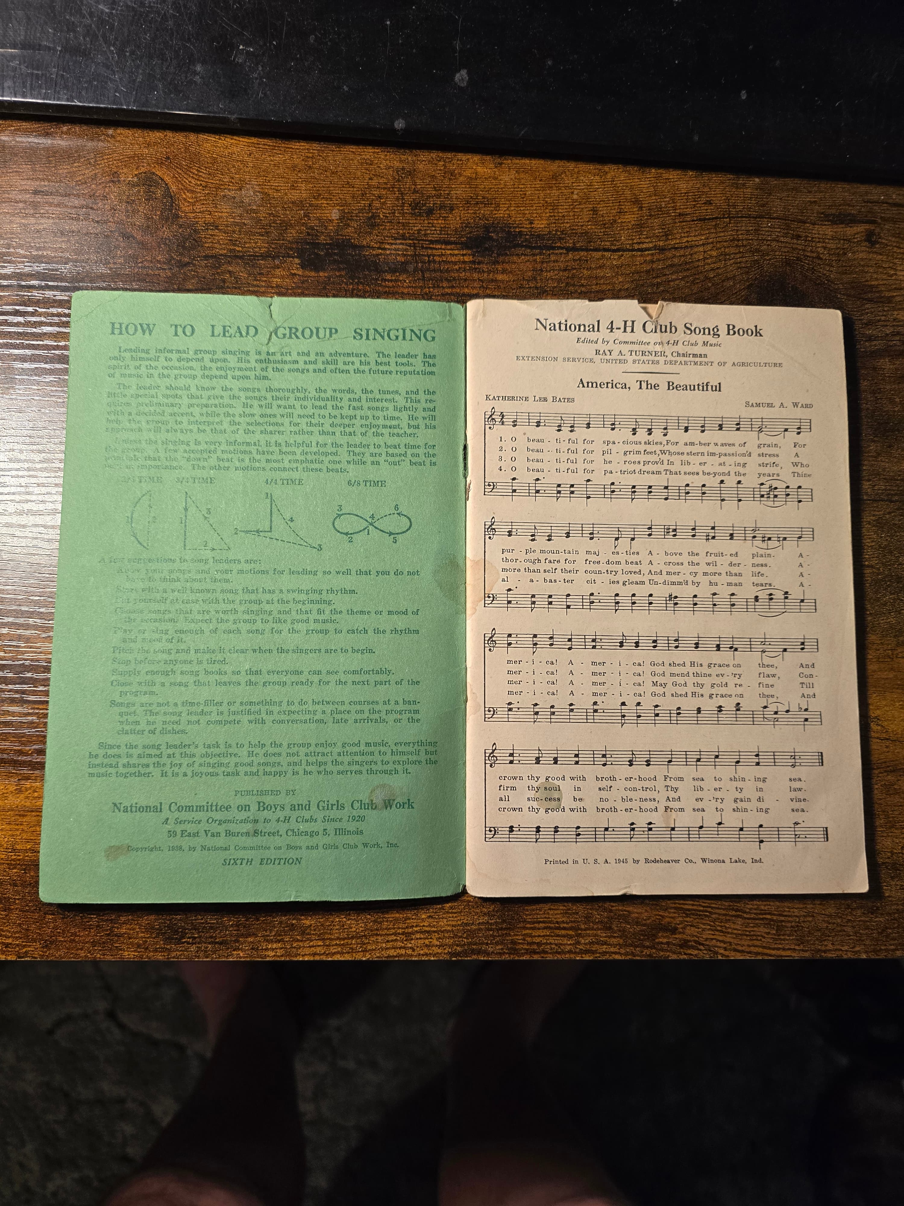Title page and America the Beautiful sheet music in the 1945 National 4-H Club Song Book