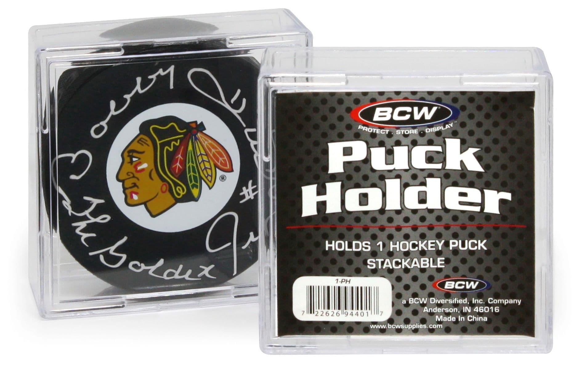 Two BCW Puck Holders. One of them has a puck inside