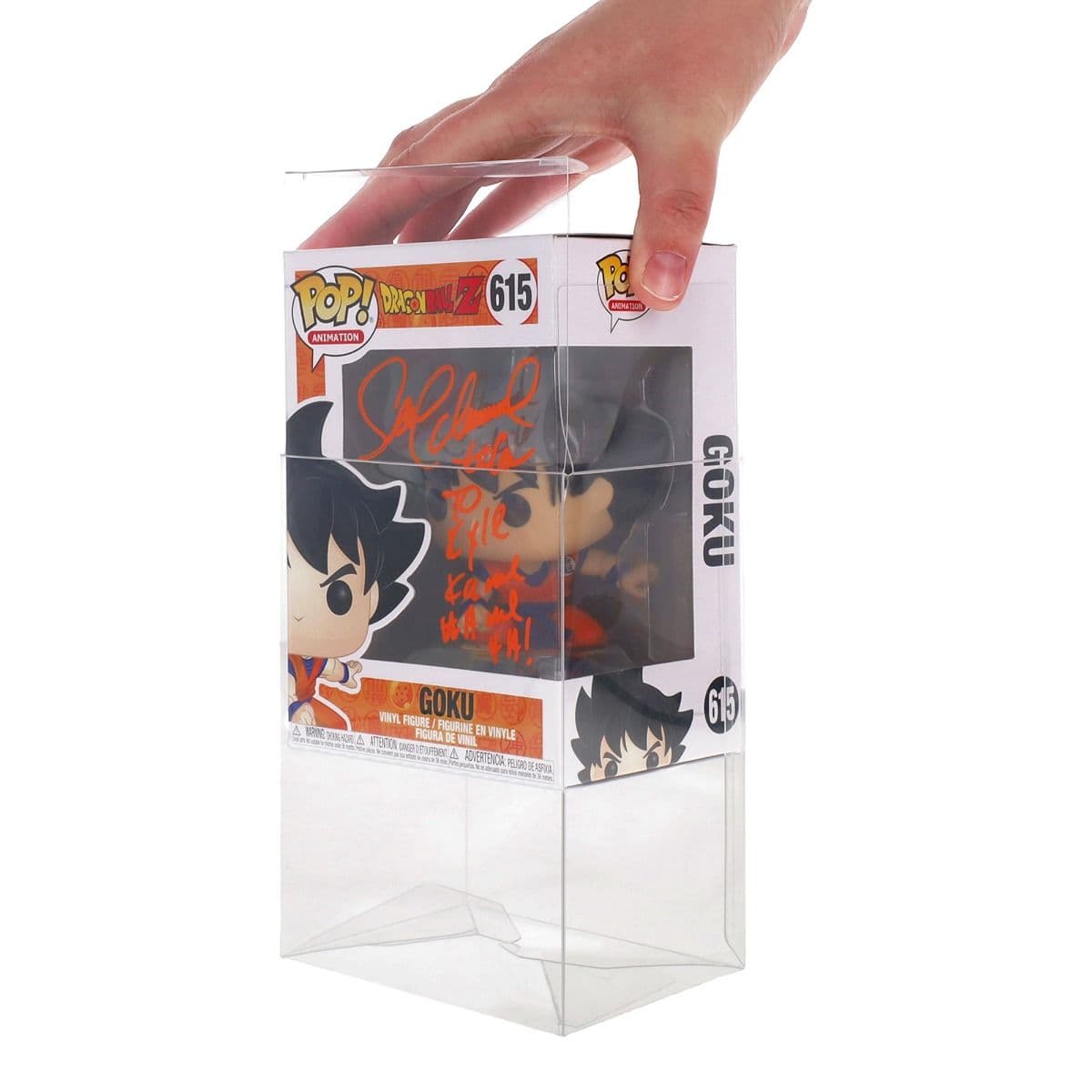 BCW Funko Pop Box, hand inserting a signed Goku Funko into the Pop Box