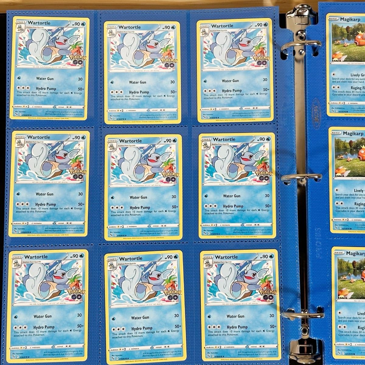 BCW Side Loading Pro 18 pages - blue. In binder filled with pokemon gaming cards