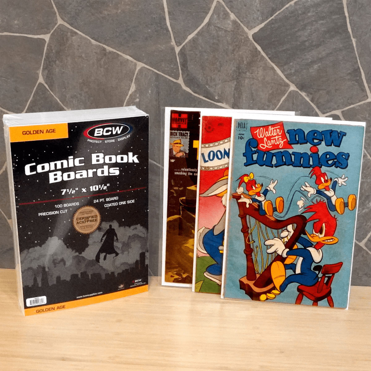 Pack of BCW Golden Age Comic Book Boards grouped with comic books bagged and boarded