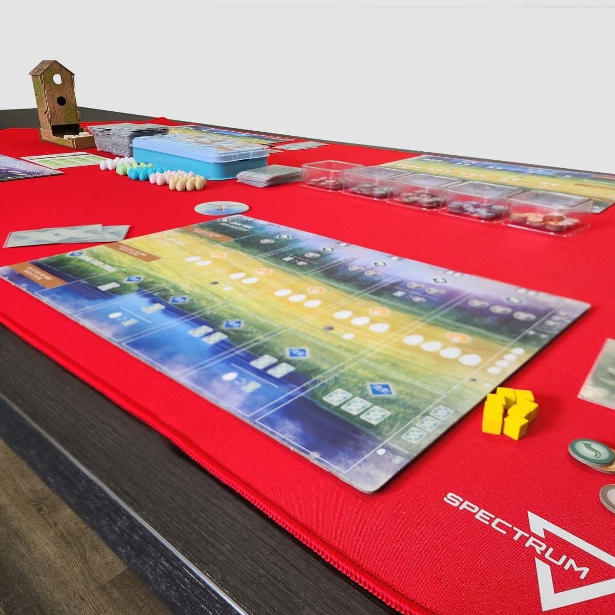 Spectrum Playmat XL Red on tabletop with Wingspan