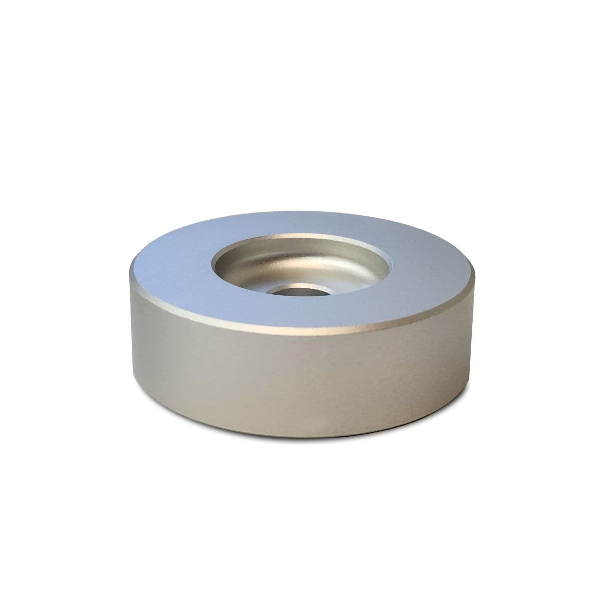 BCW 7 Inch Record Player Adapter - Classic, a compact, circular adapter made from durable aluminum with a smooth, silver finish. Designed to fit the center hole of 7-inch vinyl records, this adapter ensures stable playback on turntables for classic single