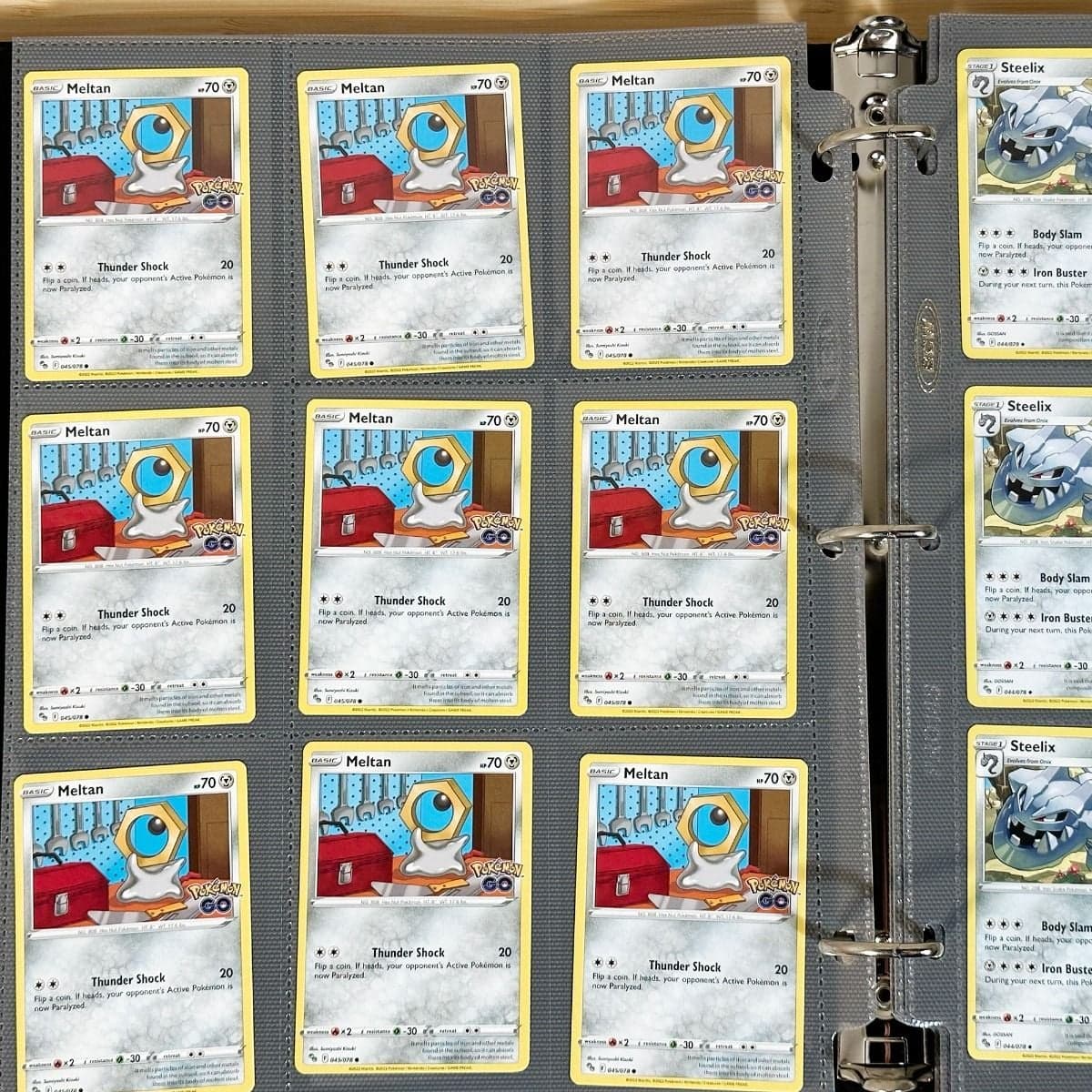 BCW Side Loading Pro 18 pages - gray. In binder filled with pokemon gaming cards