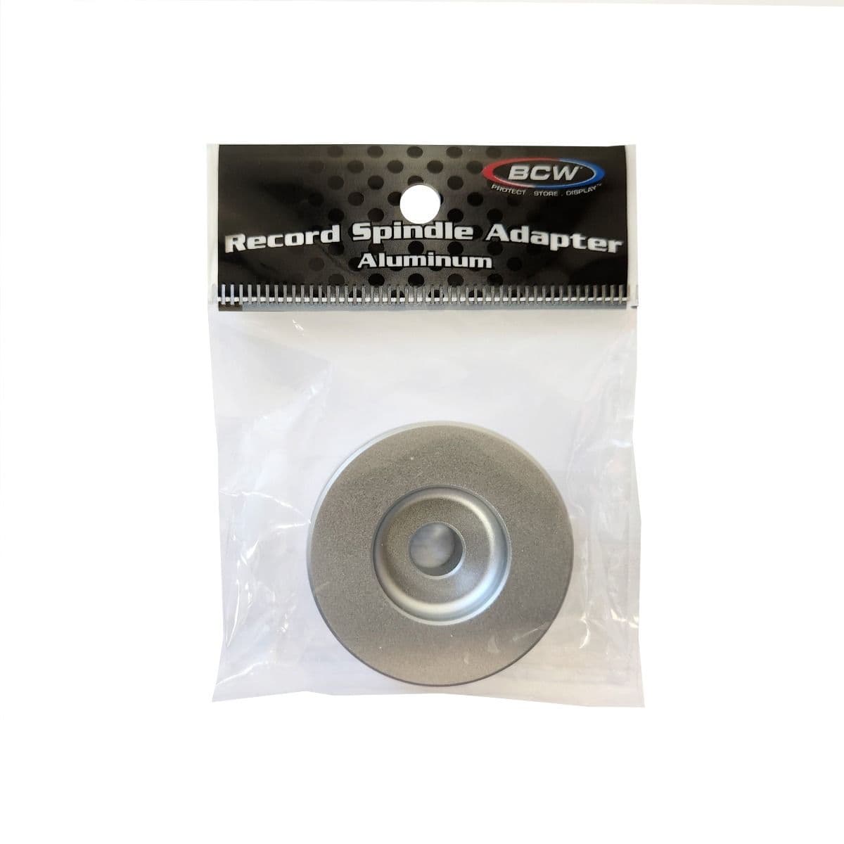 BCW 7 Inch Record Player Adapter - Classic, packaged in a clear plastic bag with branded header. The silver aluminum adapter is visible through the packaging, labeled as 'Record Spindle Adapter Aluminum,' designed for use with 7-inch vinyl records to ensu