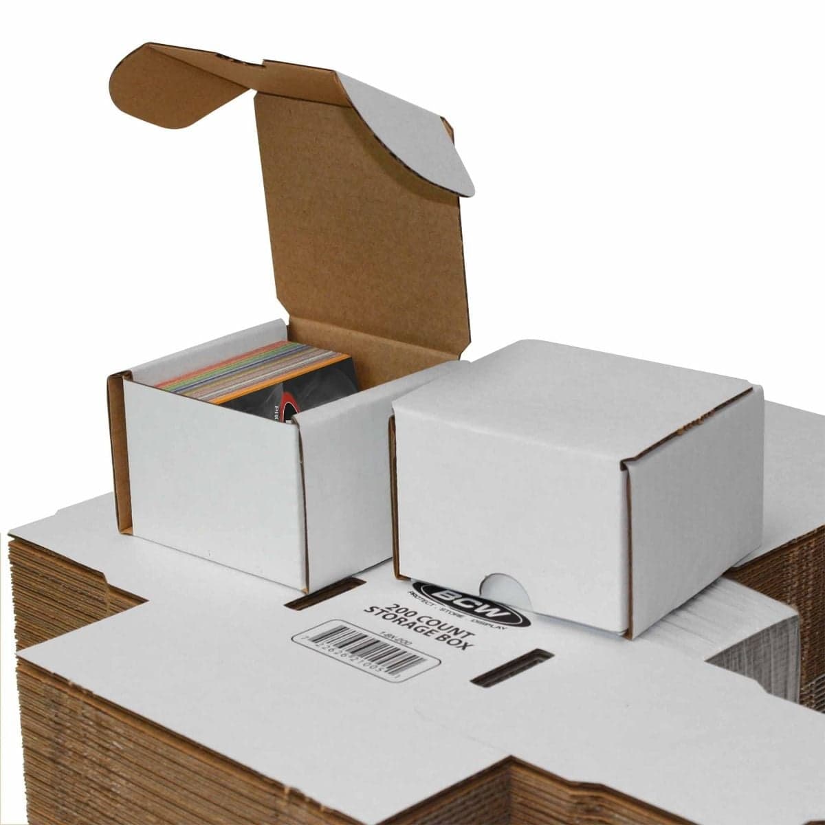 2 BCW 200 count boxes, one closed, one open partially filled with cards over bundle of boxes
