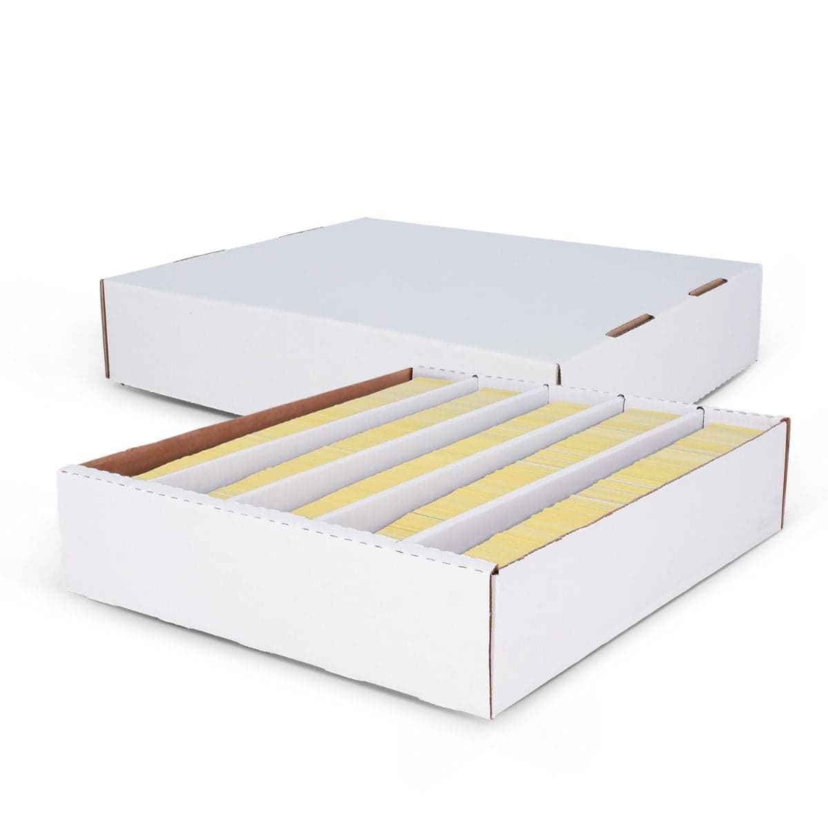 Image of box full of cards at an angle in the front with the lid behind the box also at an angle