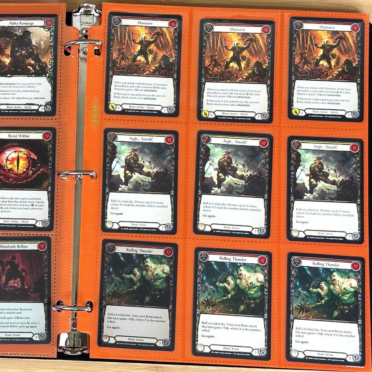 BCW Side Loading Pro 18 pages - orange. In binder filled with gaming cards