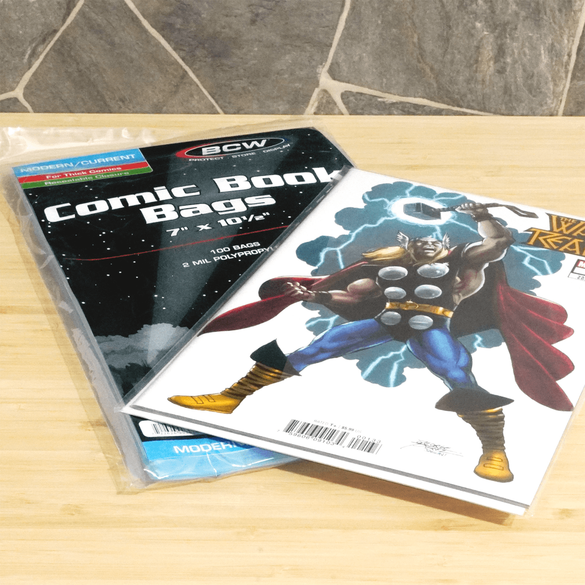 BCW Resealable and Thick Comic Book Bags. Current, Modern. packaging with comic in bag displayed