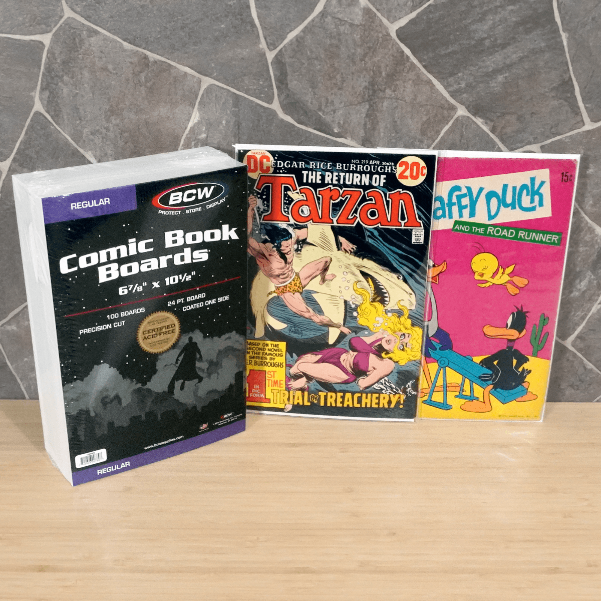 Package of BCW Regular Comic Book Boards grouped with comic books