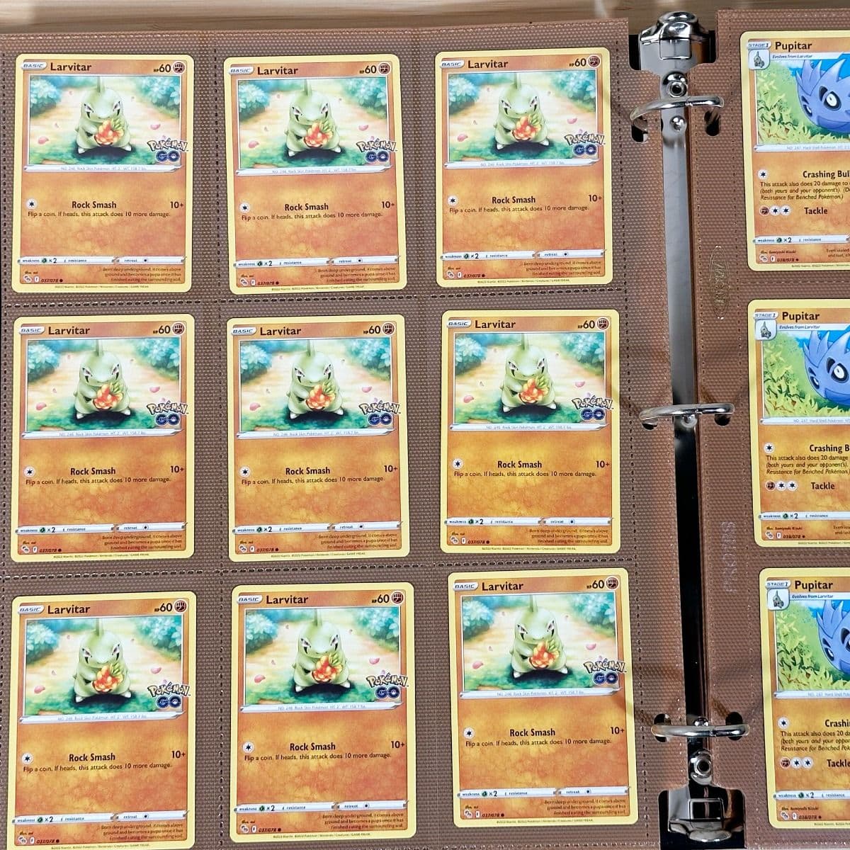 BCW Side Loading Pro 18 pages - brown. In binder filled with pokemon gaming cards