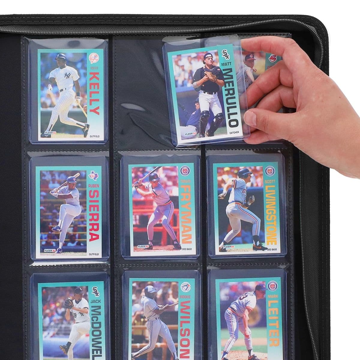 BCW Z-Folio 9-Pocket LX Album - Toploaders - Black hand inserting toploaded card into page