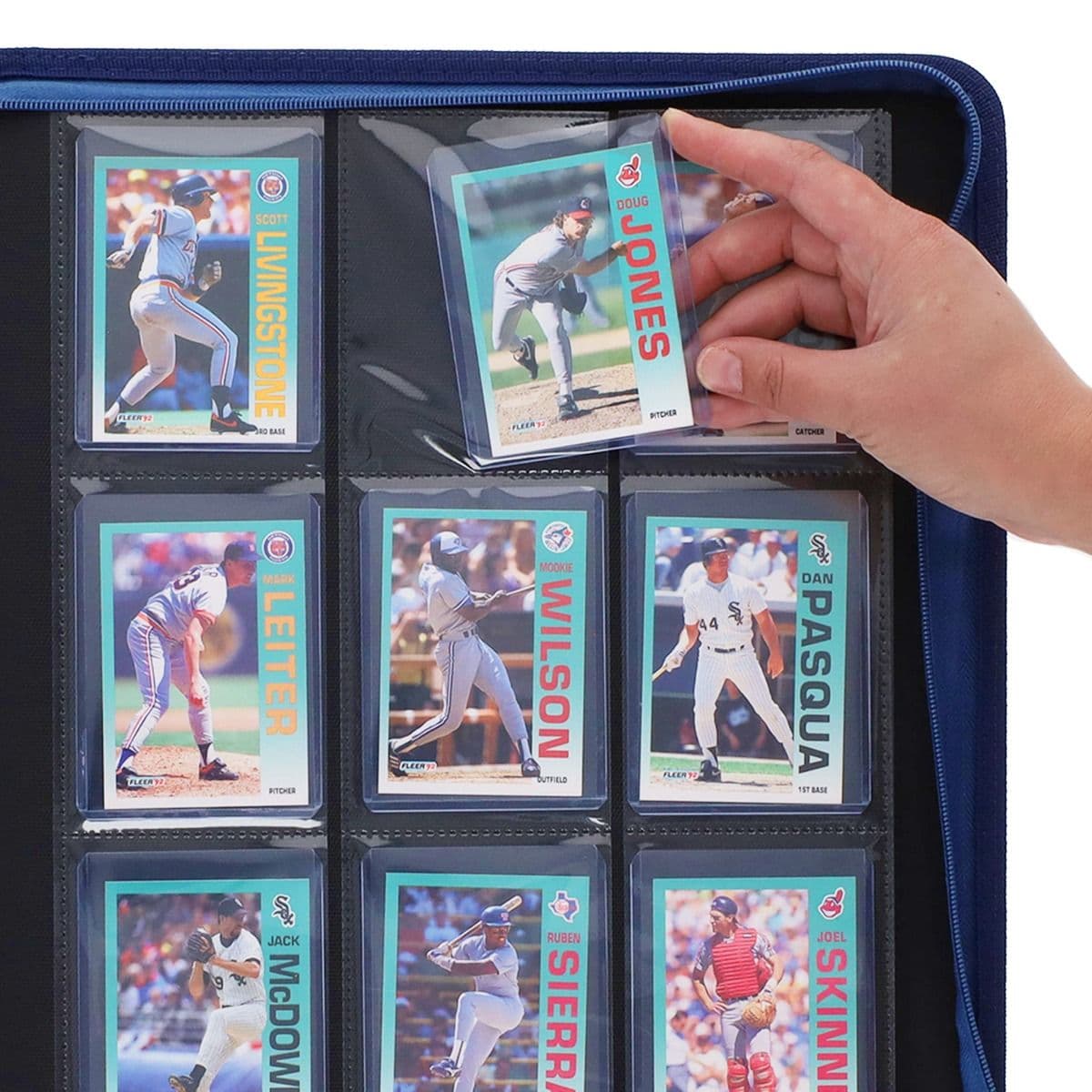 BCW Z-Folio 9-Pocket LX Album - Toploaders - Blue hand inserting toploaded card into page