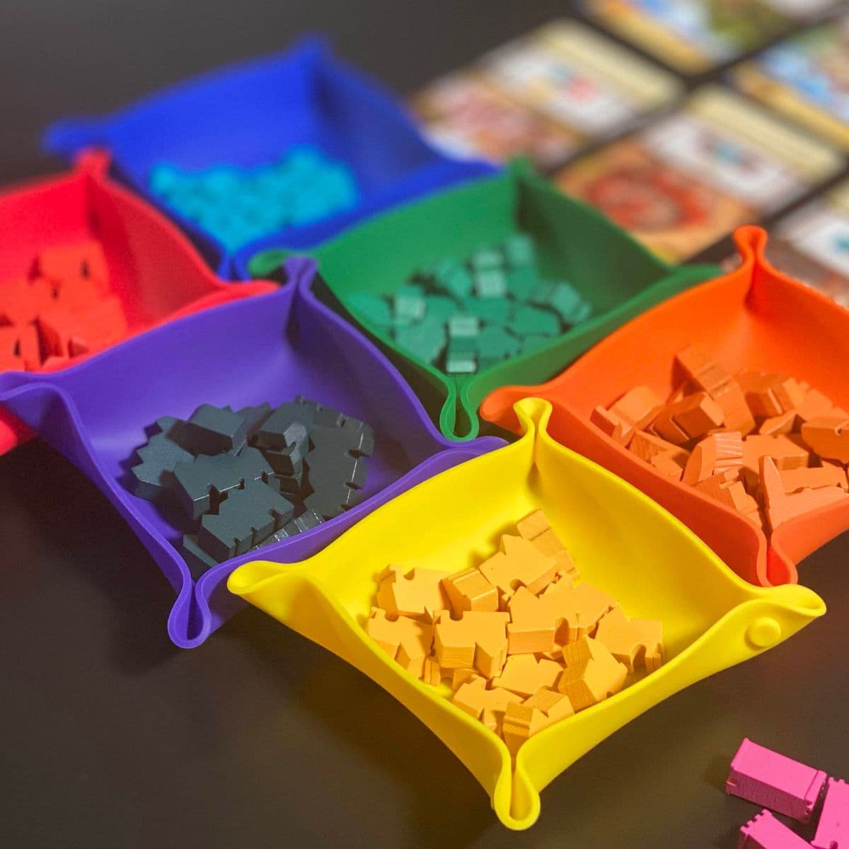 Spectrum bit trays in assorted colors with items inside