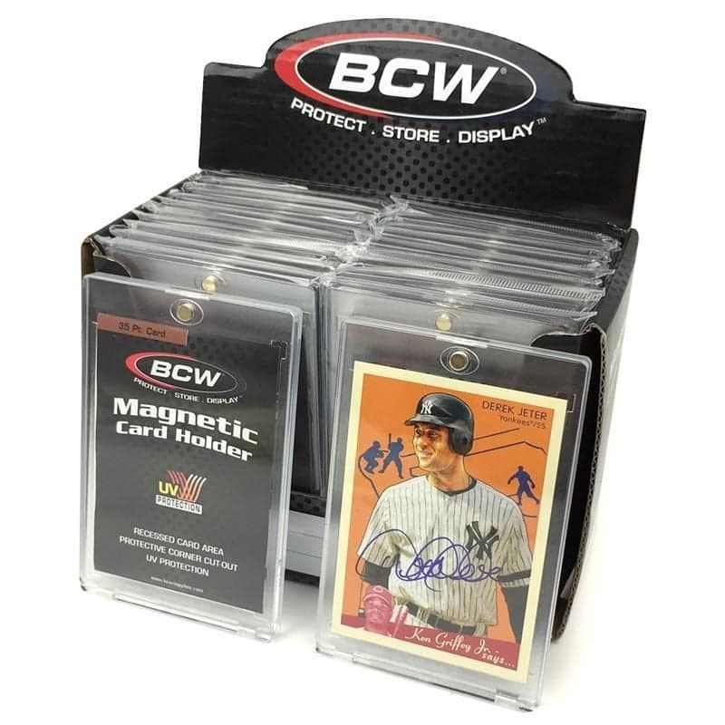 Box of BCW 35 point magnetic card holders with 2 holders with cards