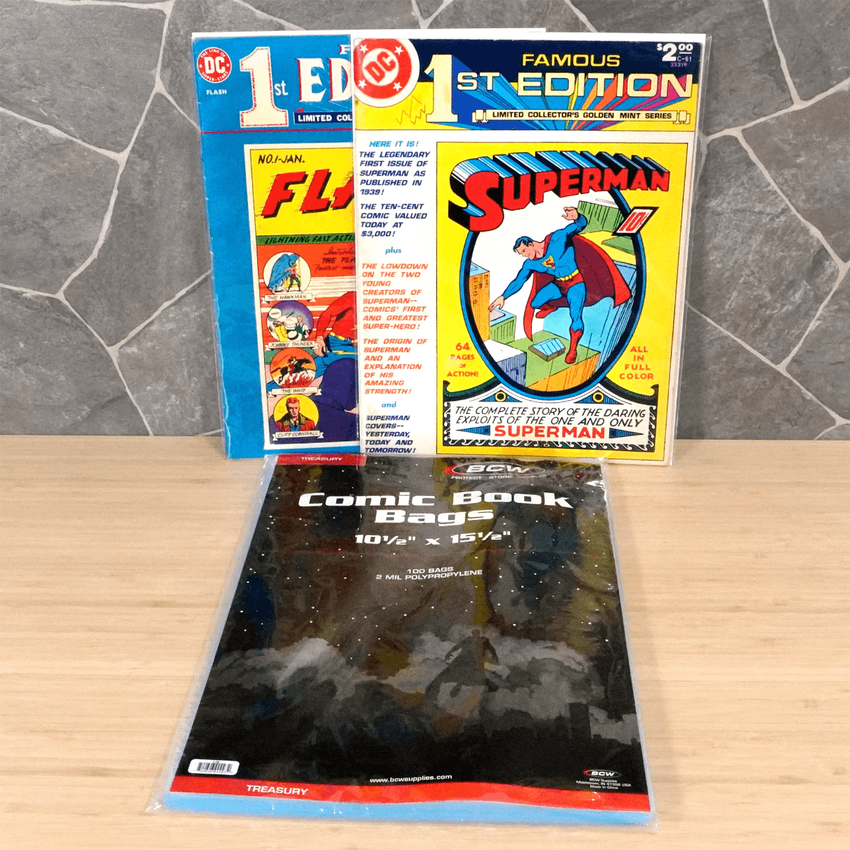 Package of BCW Treasury Comic Book Bags next to displayed and bagged comics