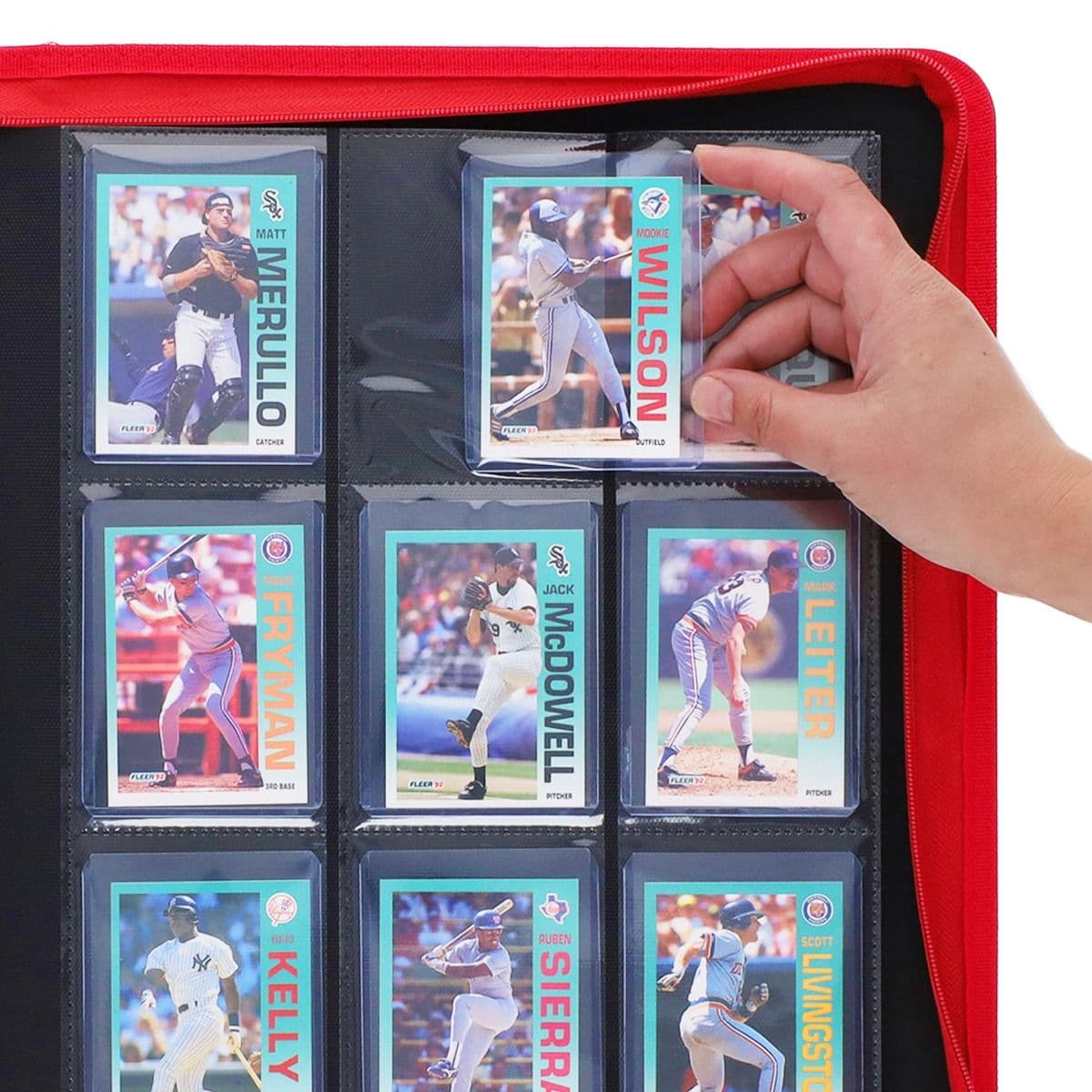 BCW Z-Folio 9-Pocket LX Album - Toploaders - Red hand inserting toploaded card into page