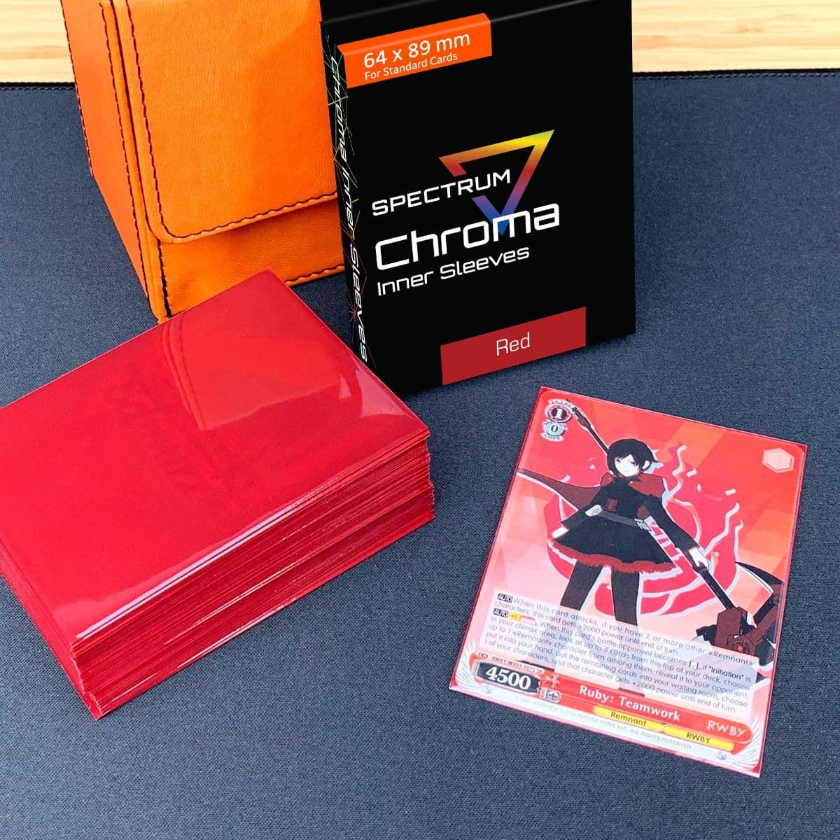 Card in Spectrum red inner sleeve next to stack of red inner sleeves.