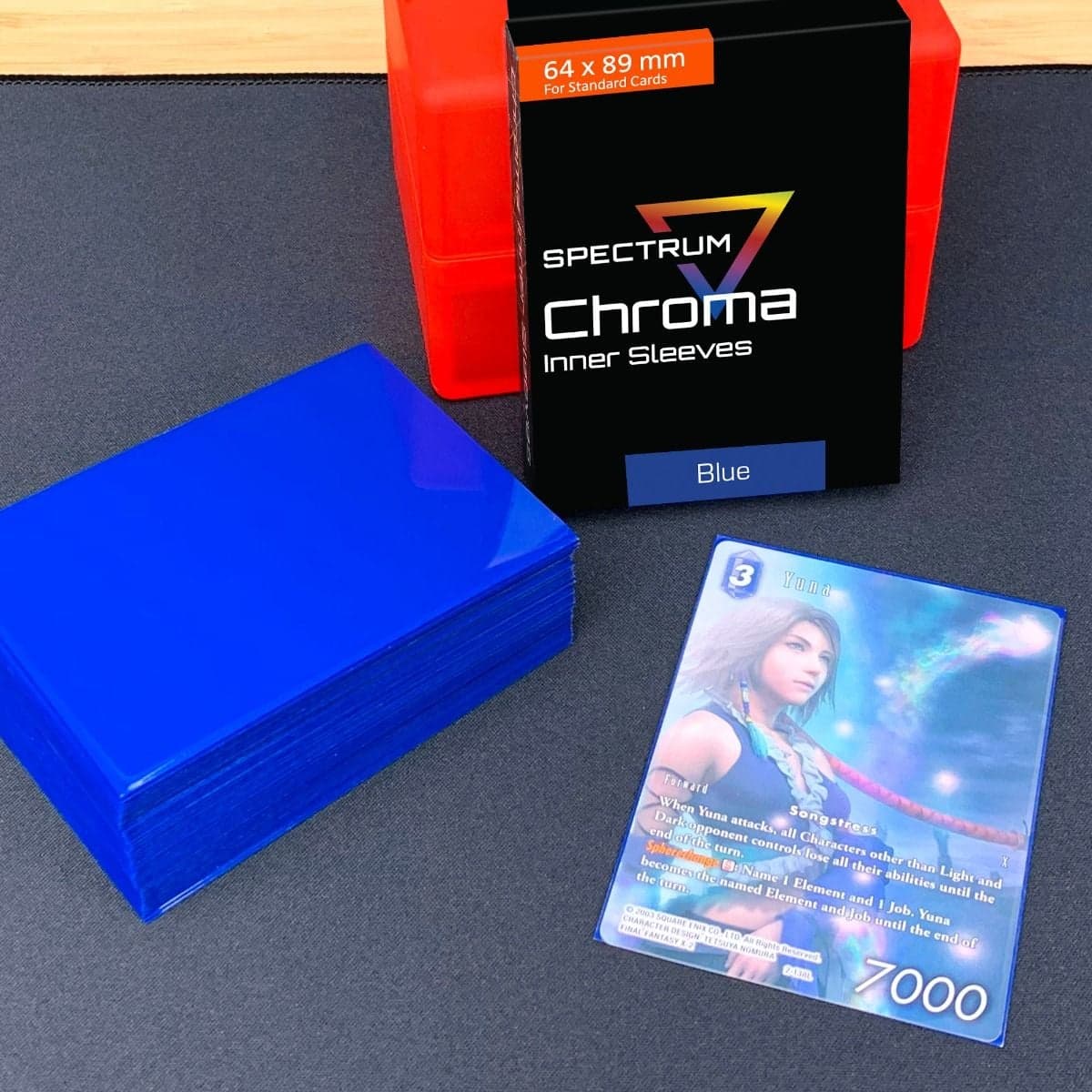 Card in Spectrum blue inner sleeve next to stack of blue inner sleeves.