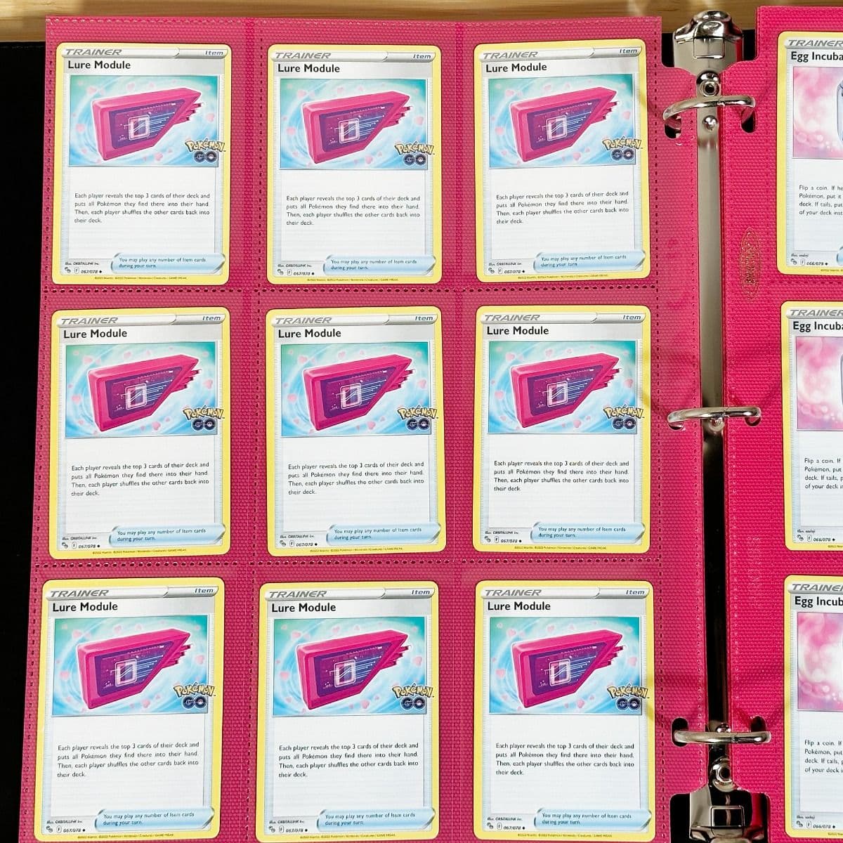 BCW Side Loading Pro 18 pages - pink. In binder filled with pokemon gaming cards