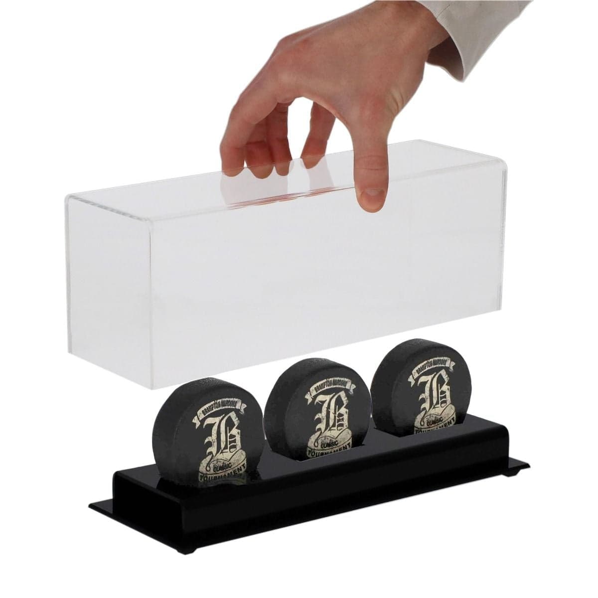 BCW Acrylic Triple Hockey Puck Display with three pucks inside lifting lid