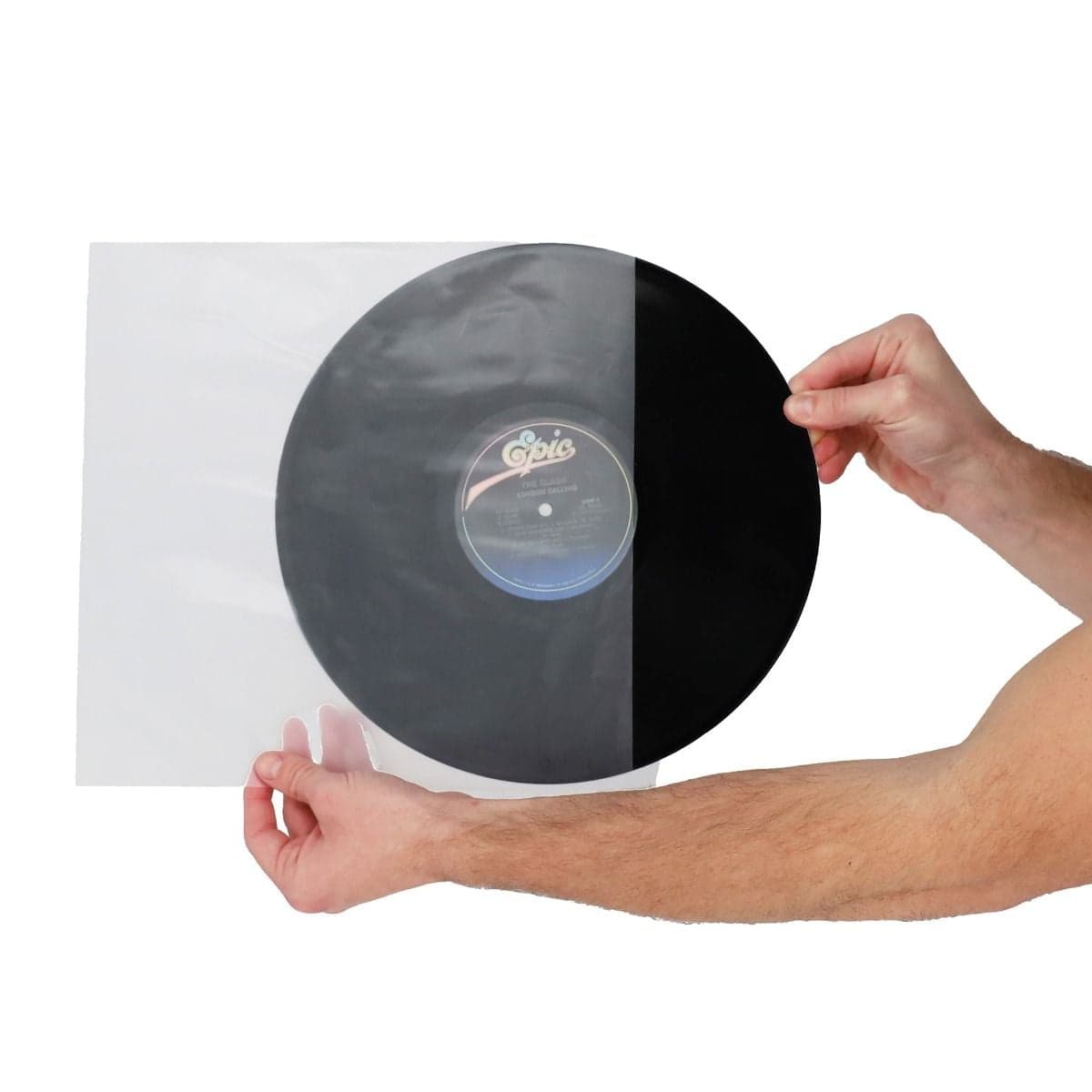 BCW 12 Inch Record Inner Sleeve - Anti-Static, hand holding and inserting a record into the inner sleeve