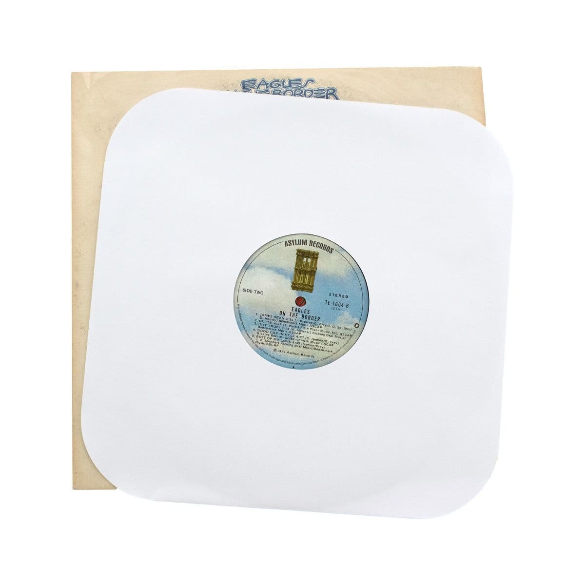 BCW 12 Inch Record Paper Inner Sleeves - Round Corners - With Hole - White, single record inside of a sleeve, laying on top of the record jacket