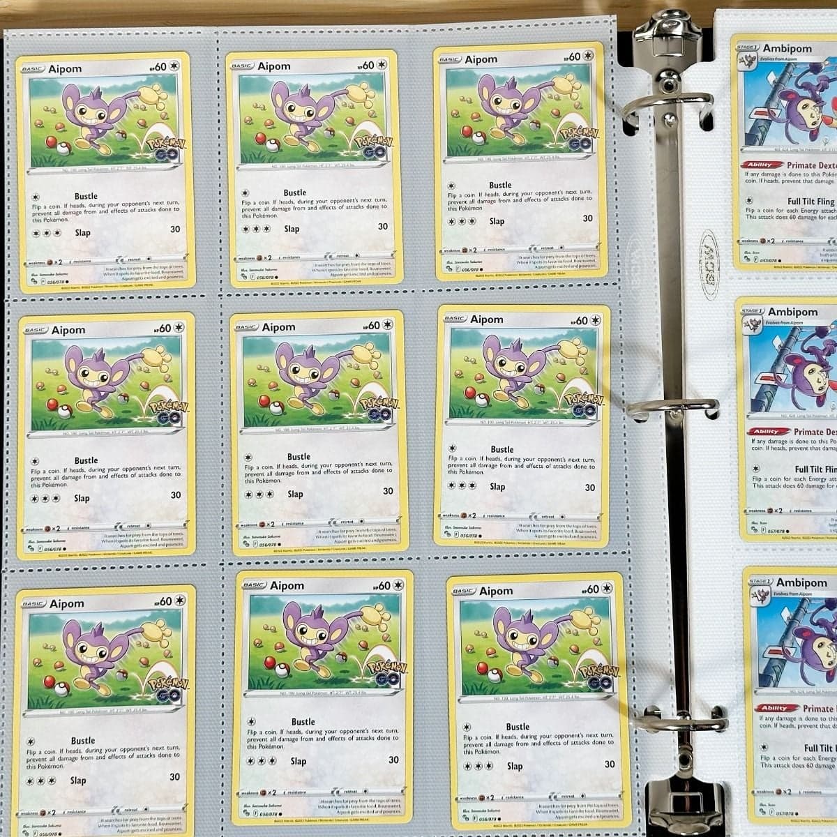 BCW Side Loading Pro 18 pages - white. In binder filled with pokemon gaming cards