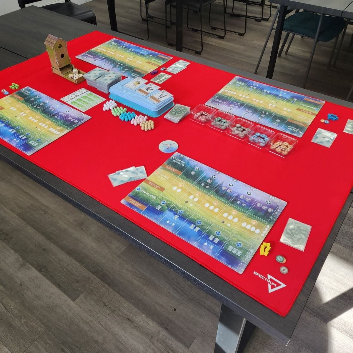 Spectrum Playmat XL Red on tabletop with Wingspan
