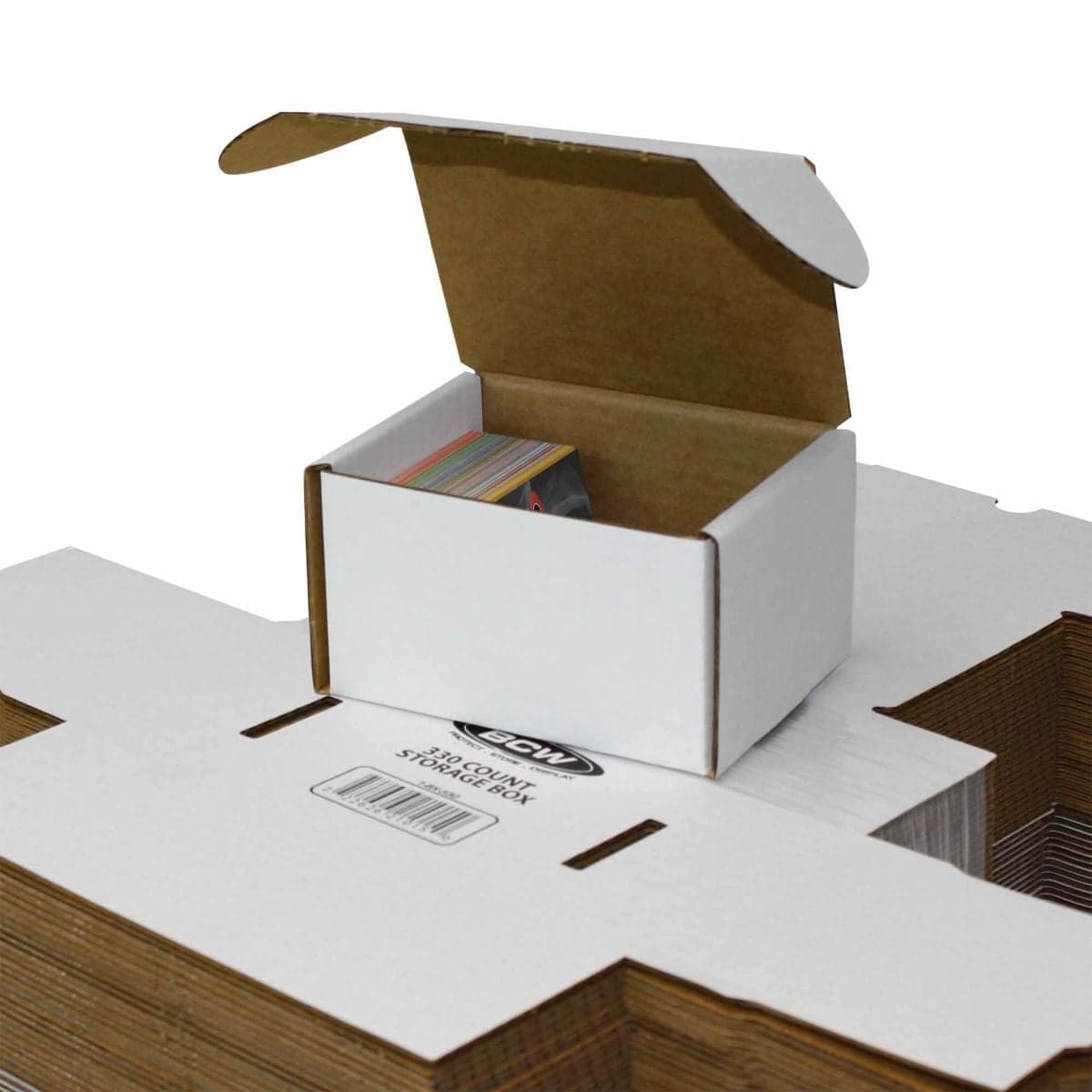 BCW 330 count box partially filled with cards over bundle of boxes