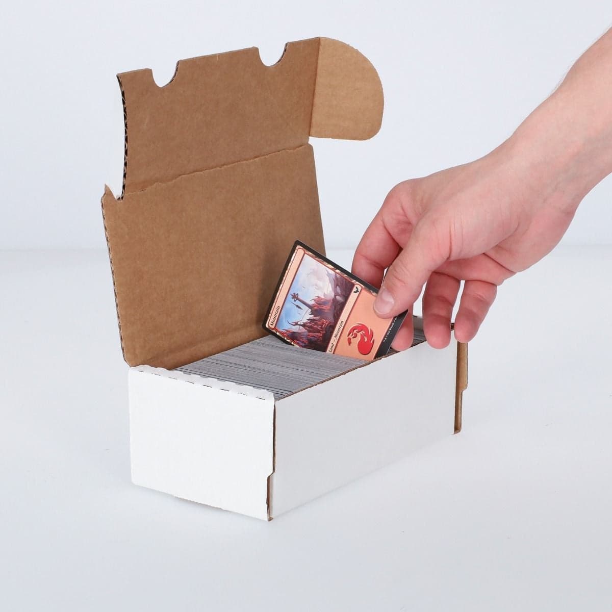 BCW 400 Count Storage Box, hand inserting a card into the box.