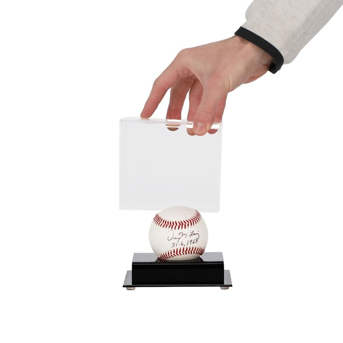 BCW Acrylic Baseball Display hand placing clear top on