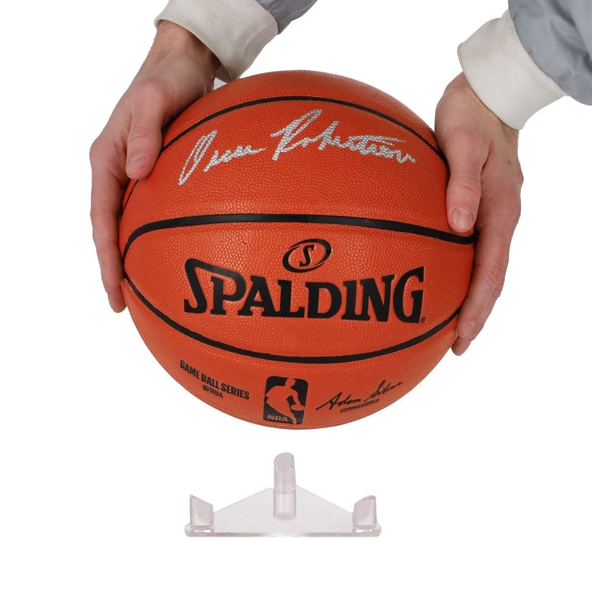 BCW Acrylic Ball Stand placing basketball on stand