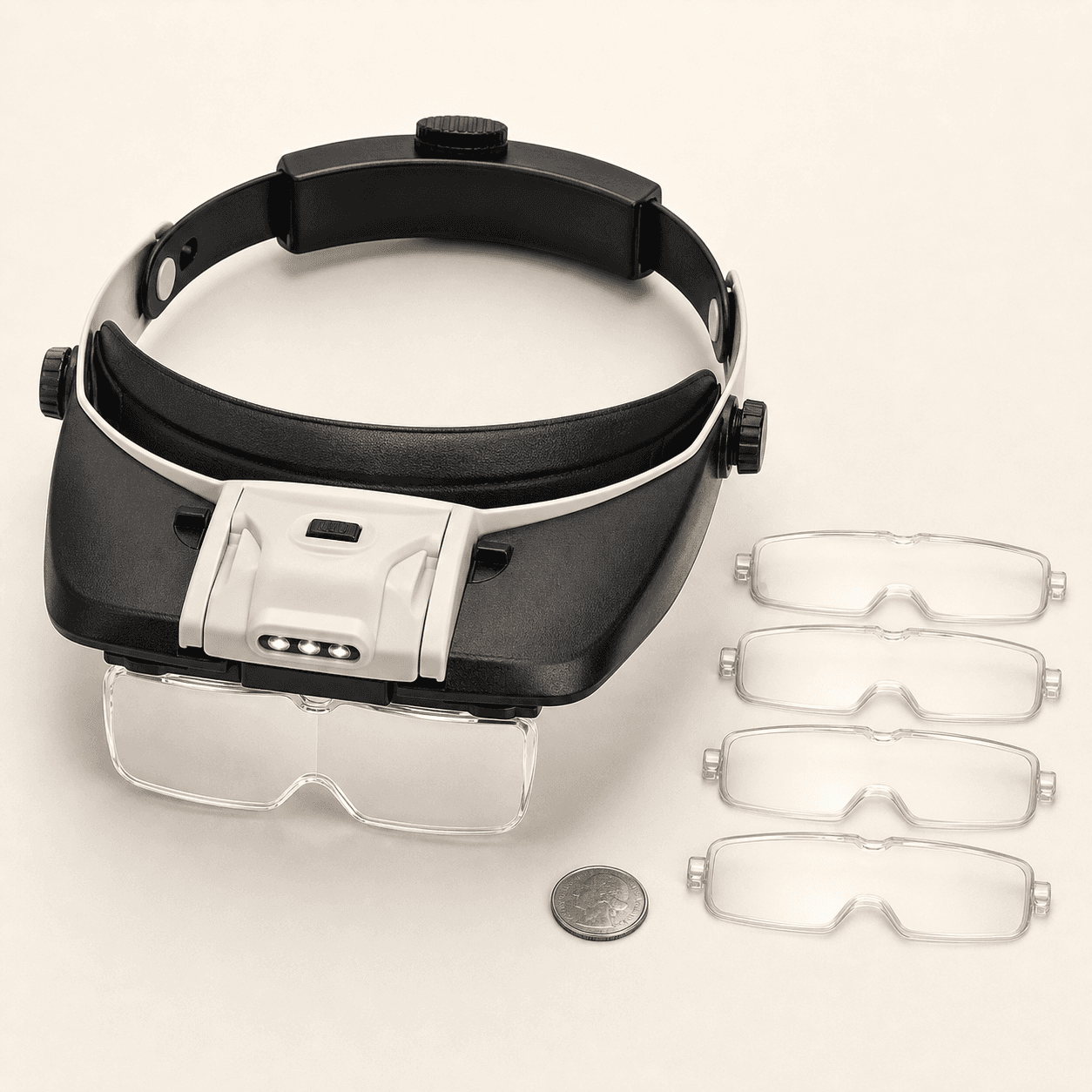 Original representative image of an adjustable illuminated headband magnifier with interchangeable clear lenses.