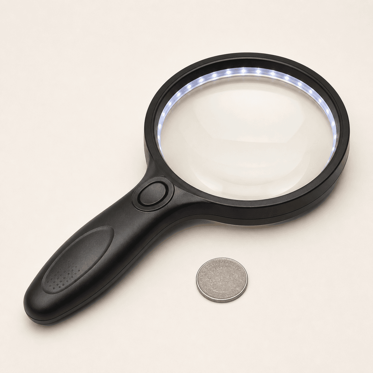 Original representative image of a large black handheld magnifier with a circular illuminated lens.