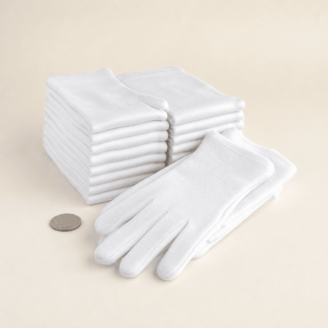 Original representative image of folded white cotton coin-handling gloves shown as a 24-piece pack.