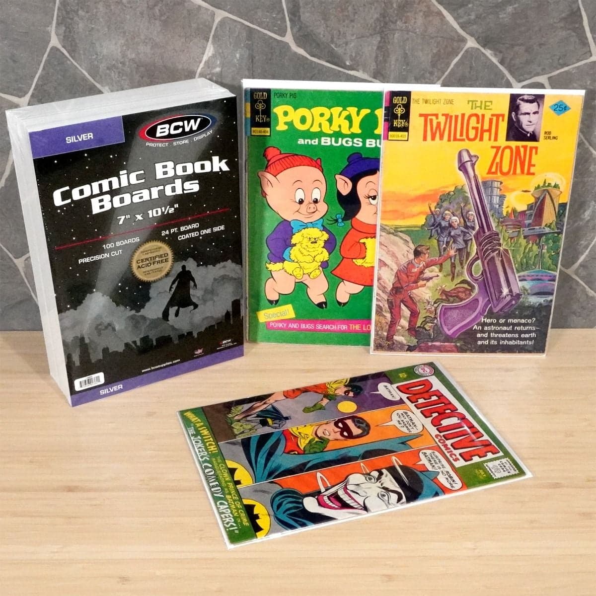 Package of BCW Silver Comic Book Boards grouped with comic books