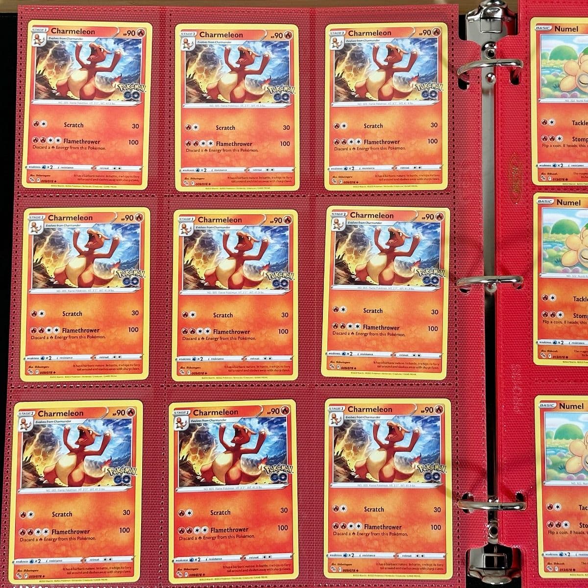 BCW Side Loading Pro 18 pages - red. In binder filled with pokemon gaming cards