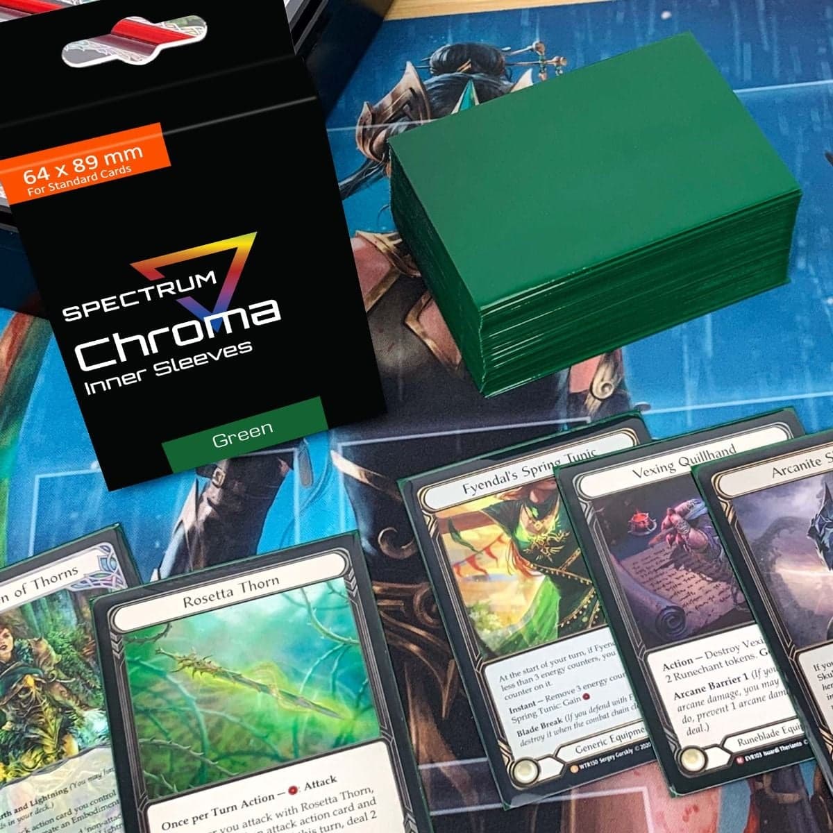 Cards in Spectrum green inner sleeve next to stack of green inner sleeves.