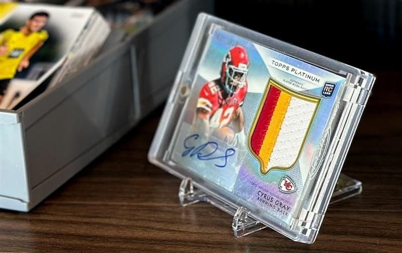 BCW 2-piece stand holding a Cyrus Gray football card