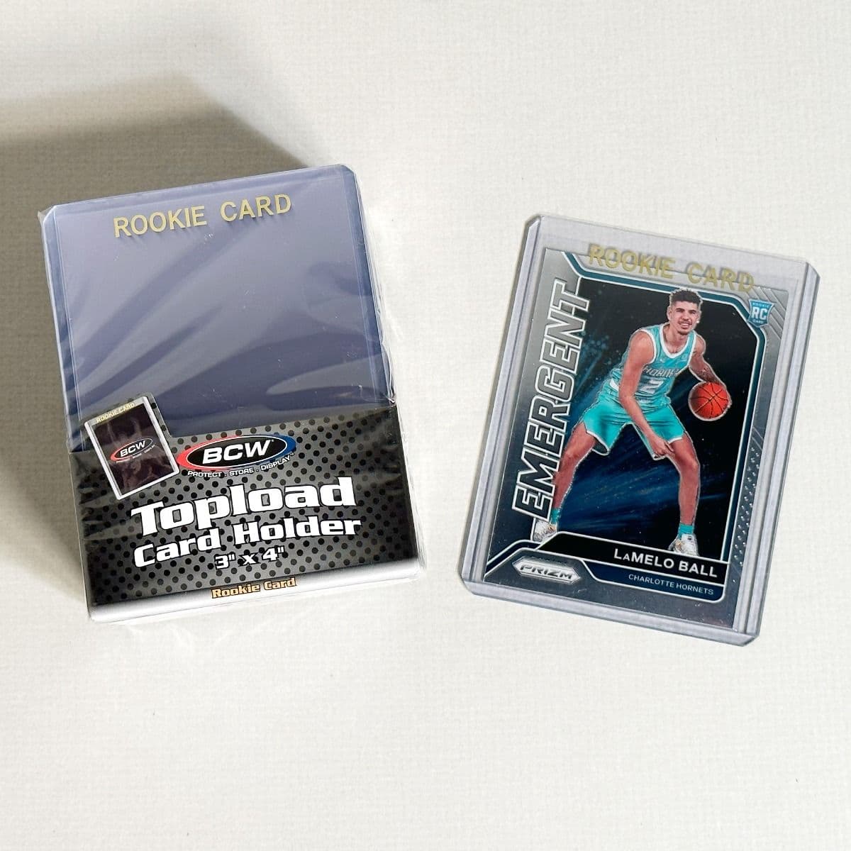 BCW Topload Card Holder gold rookie card imprinted pack. 3x4. Basketball Card in holder grouped