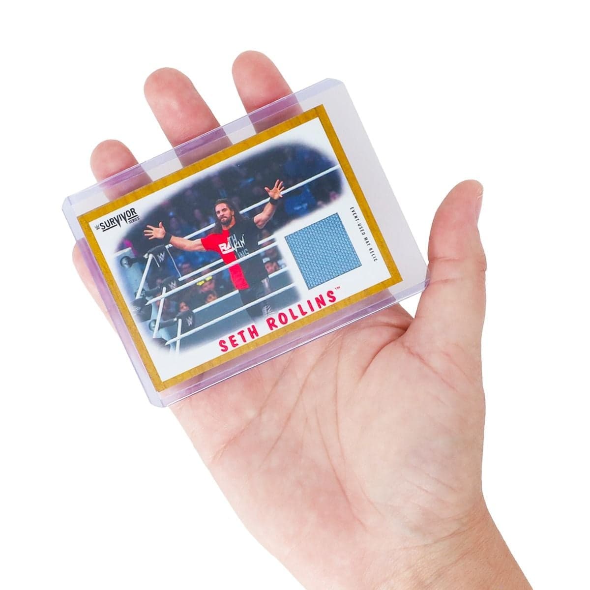 Hand holding a BCW thick top load card holder containing a mid-thickness collectible memorabilia trading card for protected storage and display.