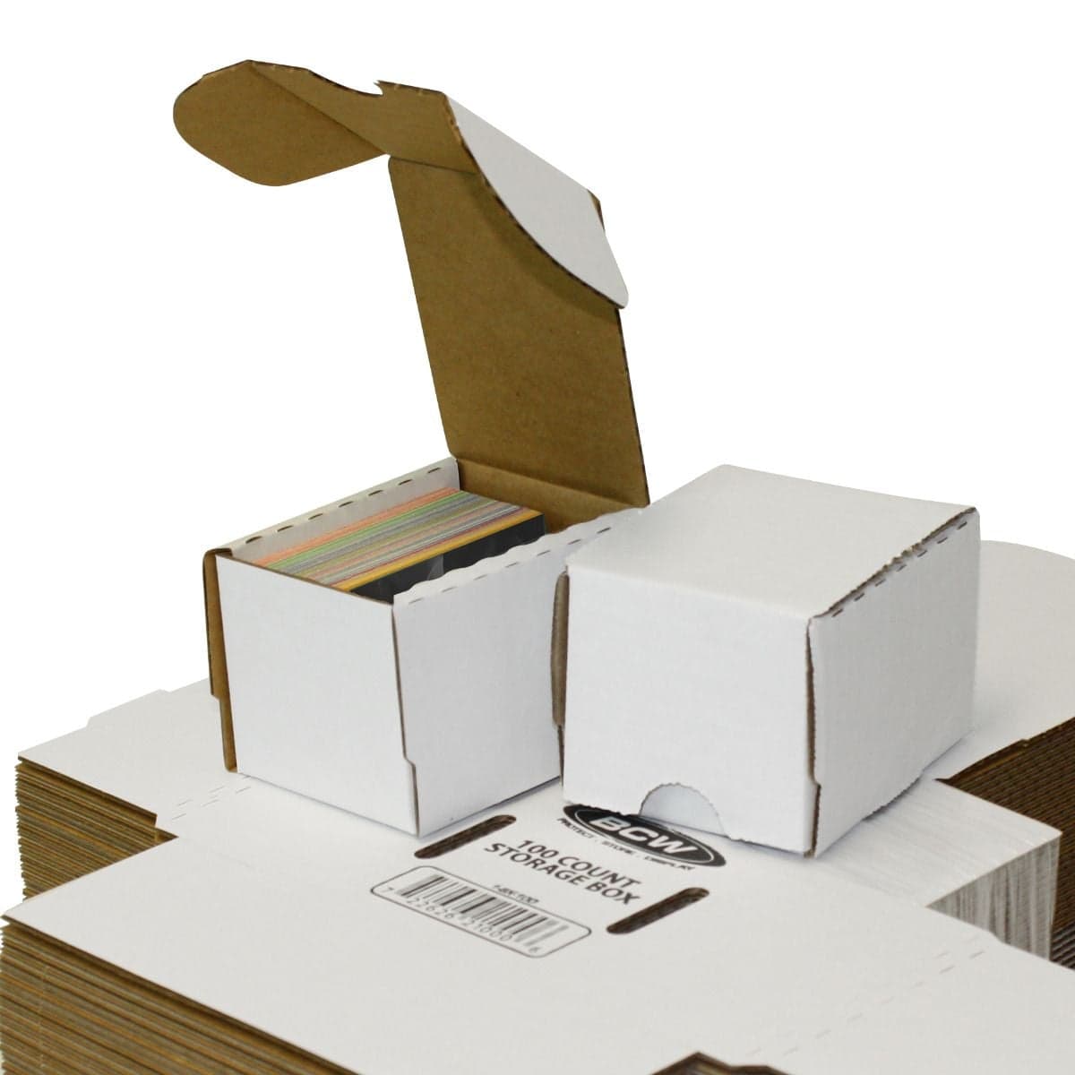2 BCW 100 count boxes, one closed, one open partially filled with cards over bundle of boxes