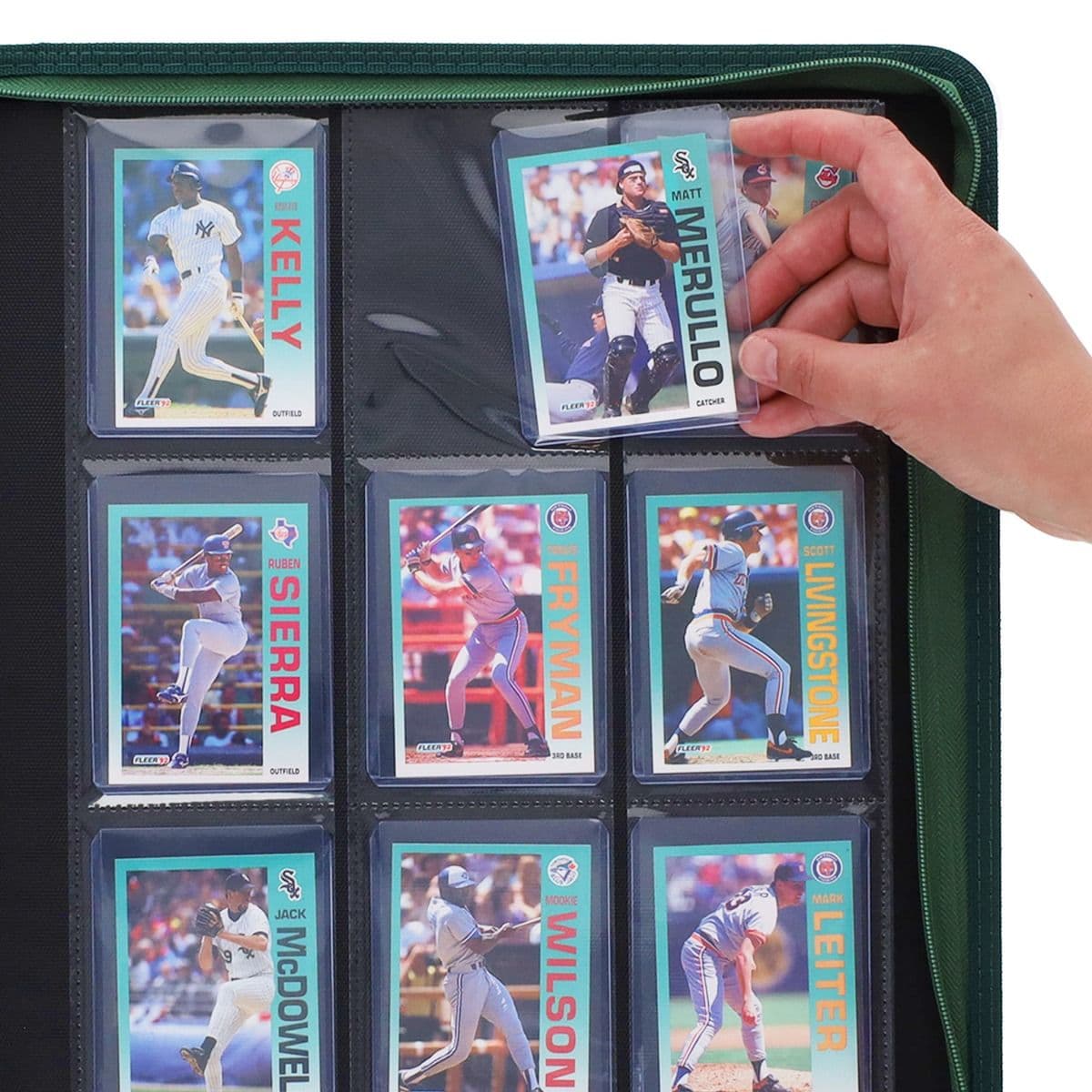 BCW Z-Folio 9-Pocket LX Album - Toploaders - Green hand inserting toploaded card into page